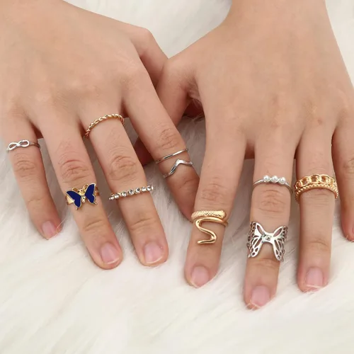 Vista 4 de Sanfenly Anillos de nudillos dorados y plateados para mujer apilables conjunto de anillos de articulación de dedo medio y mariposa serpiente