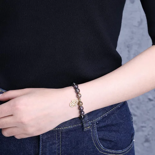 Vista 2 de COAI Pulsera Hamsa de piedra turmalina negra con dije de mano