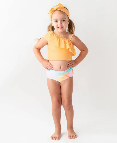 Vista 2 de RuffleButts - Traje de baño corto de 2 piezas estilo tankini con péplum y volantes para bebés y niñas