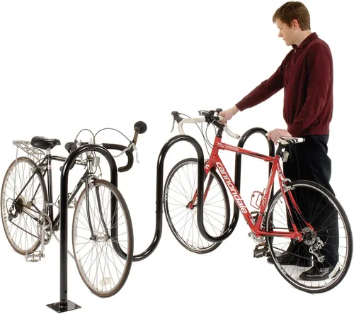 Vista 4 de Global Industrial 68" L Wave Portabicicletas, negro, montaje con brida, capacidad para 7 bicicletas