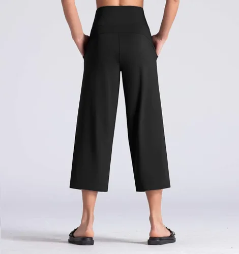 Vista 3 de THE GYM PEOPLE Bootleg - Pantalones capri de yoga para mujer, control de abdomen, cintura alta, pantalones cortos acampanados con bolsillos