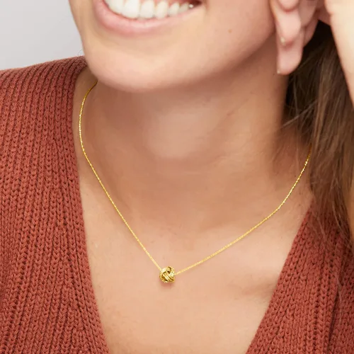 Vista 6 de Ross-Simons - Collar texturado con nudo del amor de oro amarillo italiano de 14 qts