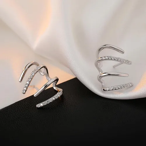 Vista 7 de Aretes magnéticos adelgazantes de acupresión 1 par de aretes de garra para mujer aretes de oreja