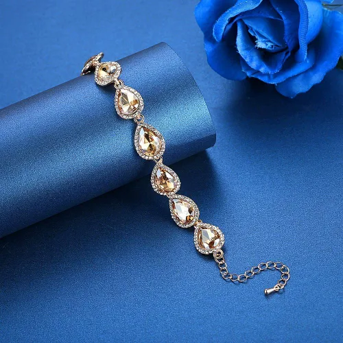 Vista 7 de Mecresh - Juego de aretes y pulsera en forma de lágrima plateadodoradochampán para mujer