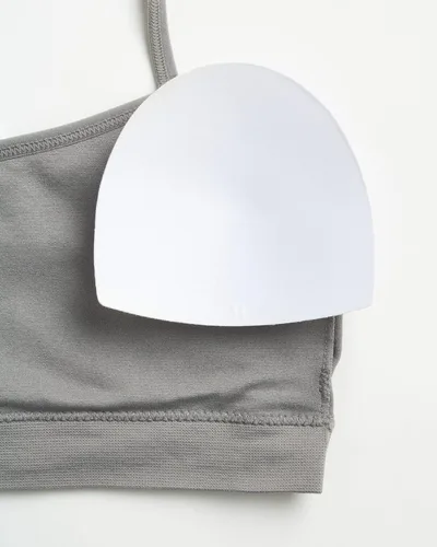 Vista 3 de Reebok Bralette para niña, sin costuras, espalda cruzada, con almohadillas extraíbles (paquete de 2)