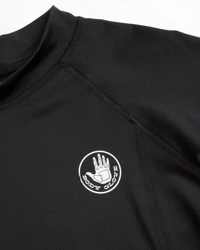 Vista 4 de Body Glove Camiseta de protección contra erupciones para niños, UPF 50+, secado rápido, protección solar y arena, trajes de baño para niños (5-14)