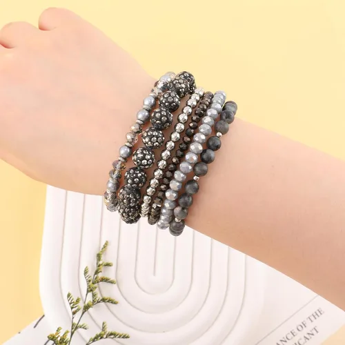 Vista 4 de Pulseras bohemias de cuentas negras para mujer, pulseras elásticas de cuentas de disco multicapa, hechas a mano, bohemias, apilables, cuentas