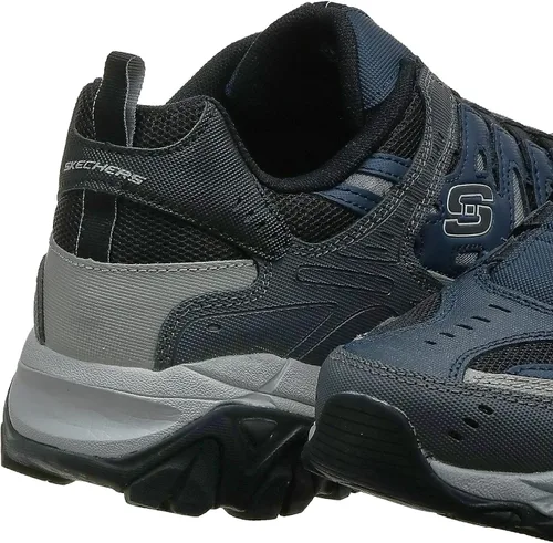 Vista 8 de Skechers Afterburn - Tenis deportivos de entrenamiento con espuma viscoelástica para hombre Strike On
