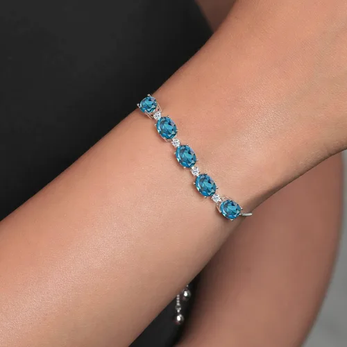 Vista 5 de Gem Stone King Pulsera de tenis de plata de ley 925 con topacio azul Londres y topacio blanco para mujer