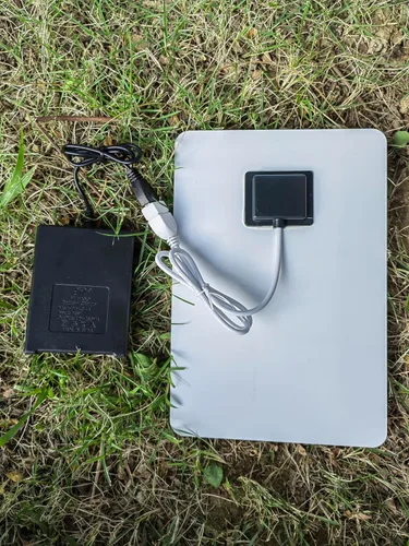 Vista 4 de HUI YINGC Cargador de energía solar con panel solar portátil de 5 vatios para baterías recargables de 1.2 V AA y AAA para el hogar, con panel solar