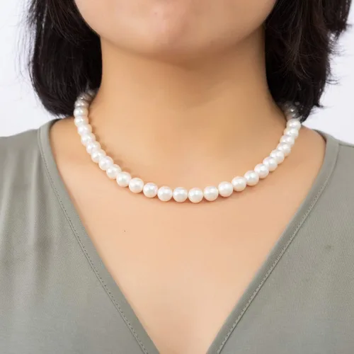 Vista 4 de LUREME Juego de collar y pulsera elástica de perlas de estilo moderno (09000649), Perla