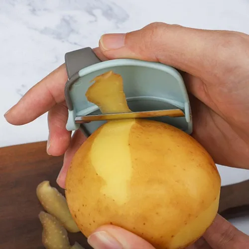 Vista 2 de HEMOTON 3 unids dedo melón rallador Veg Peeler Face Raspador Herramienta Pelador de patatas Dedo Pelador Naranja Patata Raspador Multifunción Palma