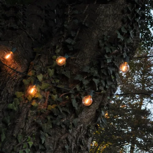 Vista 3 de Hometown Evolution, Inc. Luces LED solares (20 LED, solares de 25 pies, 20 bombillas LED G40 transparentes)
