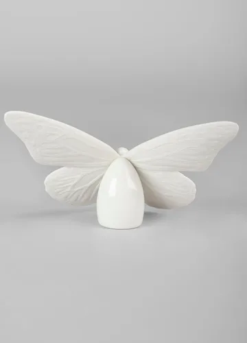 Vista 4 de LLADRÓ Figura de mariposa. Brillo dorado y blanco. Figura de mariposa de porcelana.