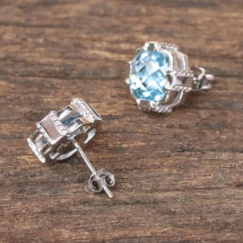 Vista 3 de NOVICA Aretes artesanales hechos a mano con topacio azul, chapados en rodio de Tailandia, plata de ley 925, piedra preciosa con piedra natal