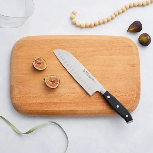 Vista 2 de Henckels Cuchillo Santoku Forjado Premio de Borde Hueco, 7 pulgadas, Negro/Acero Inoxidable