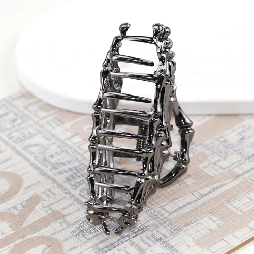 Vista 7 de AIUPUOC Pinza de pelo negro con diseño de calavera de esqueleto para peinar el cabello de mujer, pinzas de metal medianas, accesorios