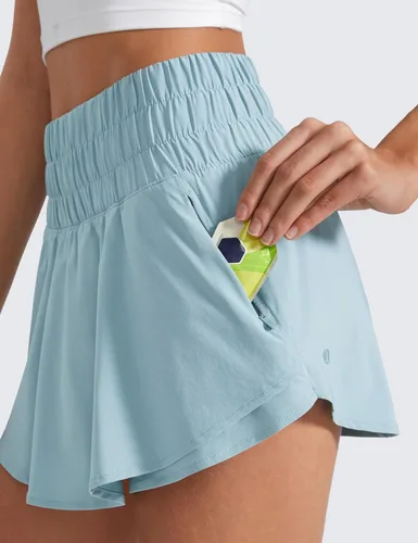 Vista 4 de CRZ YOGA - Pantalones cortos deportivos para mujer, cintura alta, holgados, con volantes, para entrenar, correr, tenis y bolsillo con cremallera