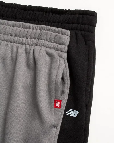 Vista 3 de New Balance Pantalones deportivos para niños Paquete de 2 pantalones deportivos de forro polar de rendimiento activo para niños con cintura