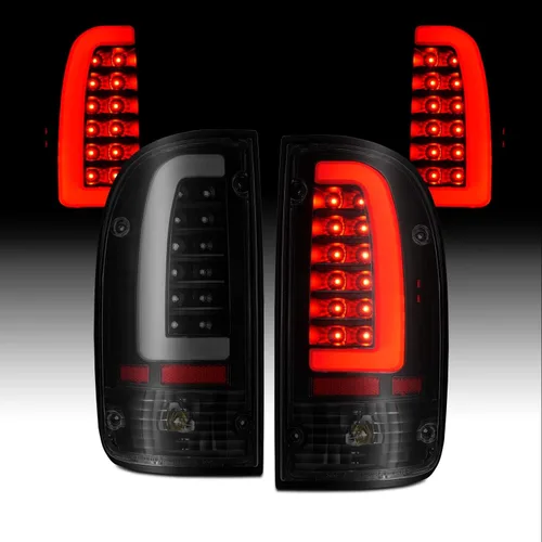 Vista 10 de AmeriLite juego de luces traseras de repuesto en negro para Toyota Tacoma 1995-2000 + bombilla y arnés - lado del pasajero y del conductor.