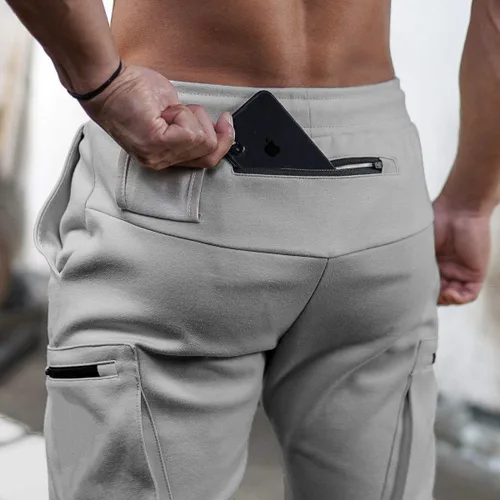 Vista 4 de Pantalones deportivos de entrenamiento para hombre, pantalones deportivos para correr, pantalones deportivos casuales con bolsillos