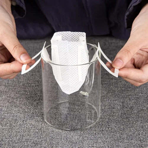 Vista 2 de PARACITY 50 bolsas de filtro de café portátiles con diseño de orejas colgantes, bolsa de papel desechable de filtro de café por goteo de una sola