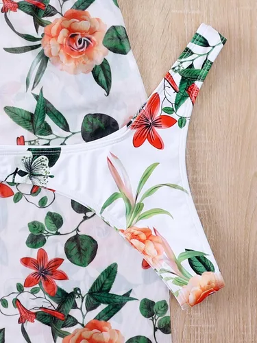 Vista 5 de WDIRARA Traje de baño de 3 piezas con estampado floral y escote halter con falda de playa dividida para mujer