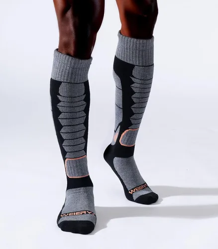Vista 2 de Calcetines de lana de merino para esquí para hombres, mujeres y jóvenes - Calcetines térmicos de snowboard con amortiguación completa por encima