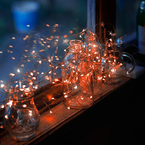Vista 7 de Twinkle Star - Tira de luces de 33 pies con 100 LED y con cable plateado, funciona con pilas, decoración para las fiestas, Navidad, Halloween, bodas