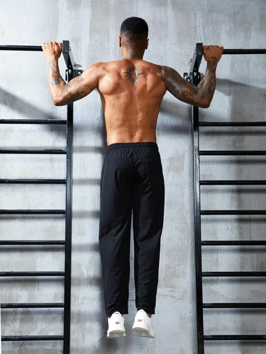 Vista 6 de Pantalones deportivos para hombre, cómodos y suaves, con bolsillos con cremallera, estilo holgado