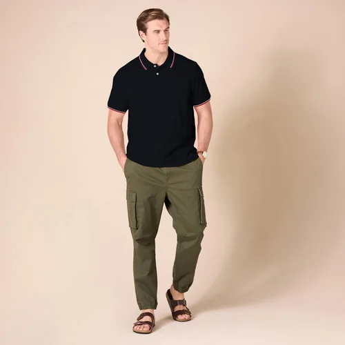 Vista 8 de Tienda Essentials Camiseta polo para hombre de manga corta y ajuste ajustado de algodón piqué