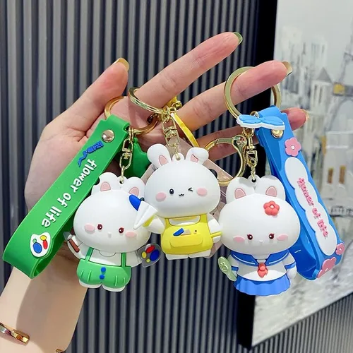 Vista 7 de BEXOA Lindo llavero de regalo de Navidad Llavero de conejo Kawaii de Año Nuevo para niños y niñas, mochila con dijes para mujeres y hombres