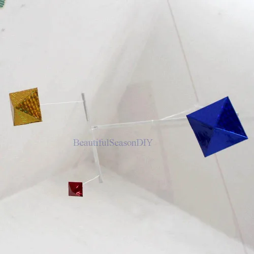 Vista 3 de Láser brillante octaédrico móvil bebé juguete brillante y brillante Montessori móvil con materiales respetuosos con el medio ambiente del bebé