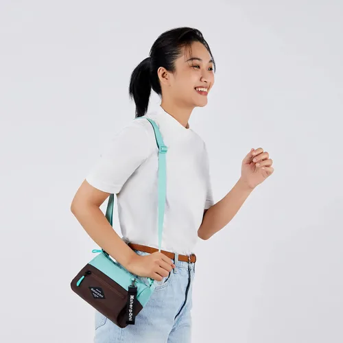 Vista 118 de Sherpani Skye - Bolso cruzado pequeño, de nailon, ligero, para mujer, con protección RFID