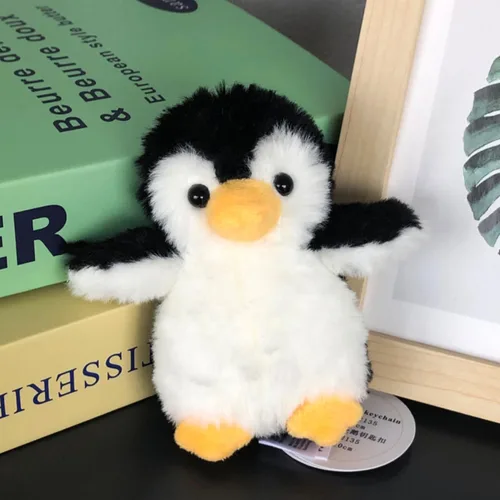 Vista 2 de Apricot Lamb Lindos juguetes antárticos de peluche de pingüino negro de peluche llavero suave para bolsa de niños, bolso, mochila y bolso