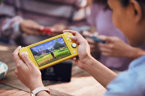 Vista 4 de Nintendo Switch Lite Handheld Gaming Console - Yellow (HDH-001) (Renewed)