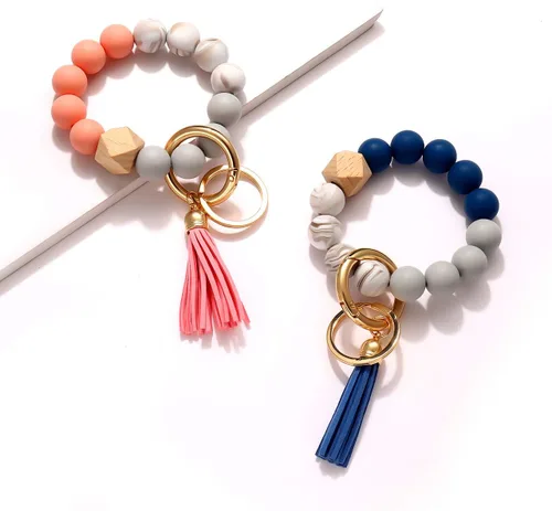 Vista 3 de 4 llaveros de silicona para mujer, pulsera elástica, llavero para casa y automóvil