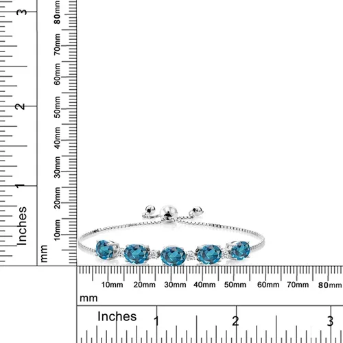 Vista 3 de Gem Stone King Pulsera de tenis de plata de ley 925 con topacio azul Londres y topacio blanco para mujer
