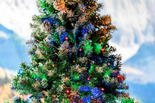 Vista 5 de Novelty Lights Guirnalda de luces LED multicolor de Navidad de 50 pies, 100 luces LED de Navidad de 6 pulgadas de espacio en cable marrón
