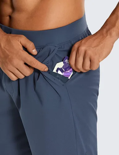 Vista 4 de CRZ YOGA Pantalones cortos de entrenamiento elásticos en cuatro direcciones para hombre, 79 pulgadas, suaves, duraderos, casuales, con bolsillos