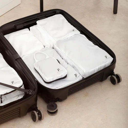 Vista 4 de Juego de 8 cubos de compresión de embalaje Diseño de doble capacidad para viajes Tamaños pequeños, medianos y grandes Bolsas organizadoras
