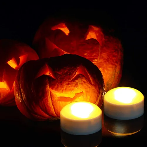 Vista 2 de Farol de calabaza LED de Halloween con control remoto y temporizador, vela eléctrica parpadeante de plástico realista brillante sin llama