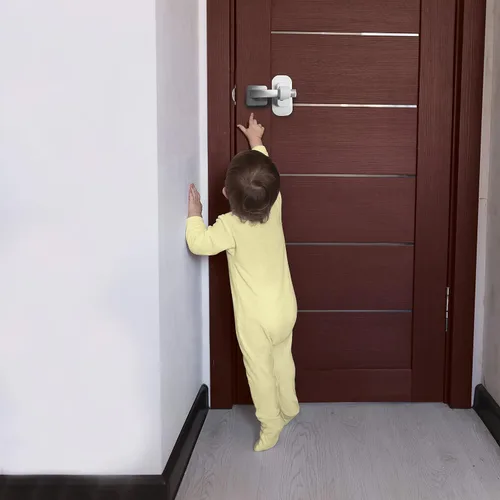 Vista 4 de Dreambaby Cerradura de manija de puerta con palanca adhesiva, cerraduras de seguridad para niños para puertas y manijas, adecuada para la mayoría
