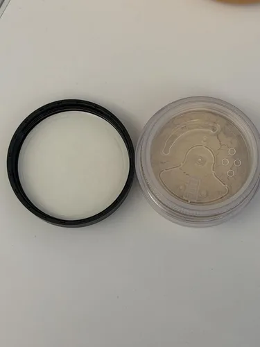 Vista 7 de Corrector cosmético tapa ojeras con protector solar factor 20.