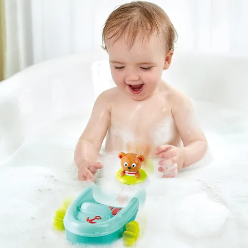 Vista 4 de Hape Juguete de baño de barco con retroceso de tubo, oso de peluche, juguete de baño flotante para remo de barco, juguete para bañera y ducha