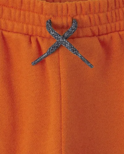 Vista 4 de Pantalones deportivos de forro polar a rayas para niños pequeños, paquete de 2