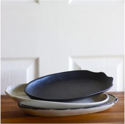 Vista 7 de roro Platos llanos de cerámica hechos a mano en negro mate (juego de 2) – 12.5 x 7.5 pulgadas diseño ovalado Artesanía artesanal para comedor
