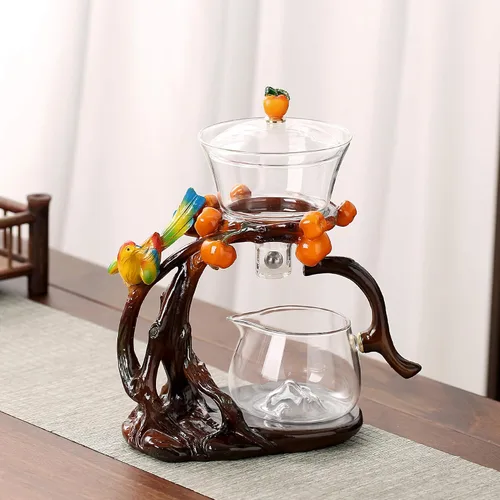 Vista 2 de Zurucily Juego de tetera de cristal Kungfu con infusor Juego de té semiautomático (naranja pájaro)