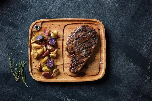 Vista 2 de Ironwood Gourmet Fort Worth Plato para Bistec con Canal para Jugos, Madera de Acacia, Juego de 4
