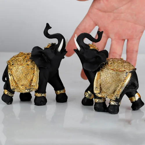 Vista 3 de Juego de decoración de elefante de la suerte con troncos – Feng Shui resina negro y dorado pareja elefante figuritas – Par de estatuas de elefantes